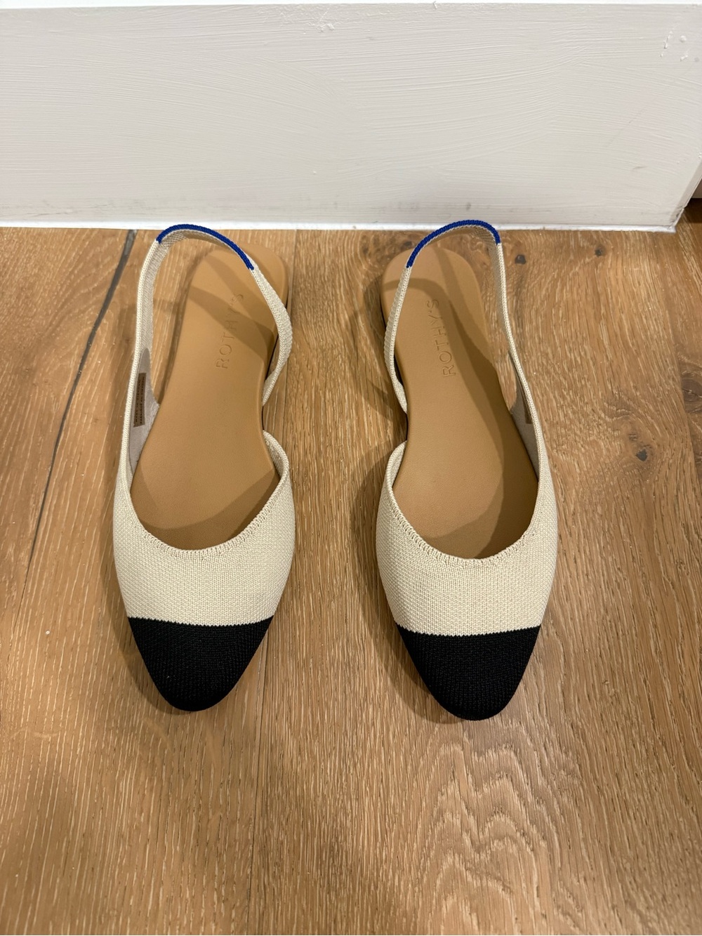 Rothy's Two-Tone Slingback Flats in Cream and Black with Blue Trim